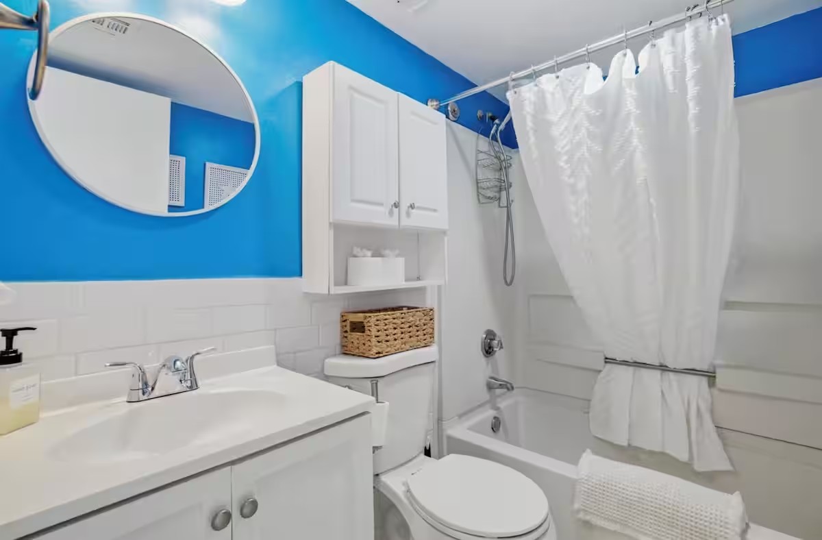 Full bathroom with tub, shower and vanity
